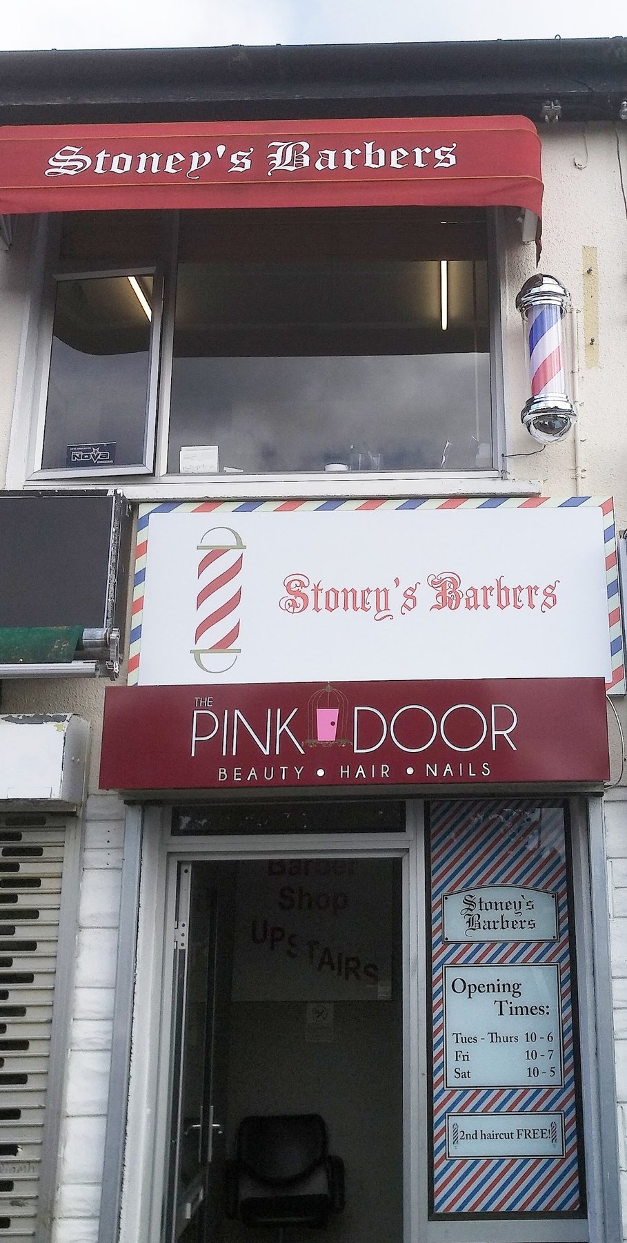 Stoney’s Barbers sign and barber pole upstairs at Oaklawn Shopping Centre, Leixlip, above The Pink Door